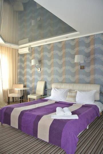 Фото номера Улучшенный номер-студио Отель Mini Hotel on Poznyaky г. Киев 17