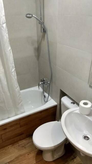 Фото номера Стандартный номер-студио Апартаменты N.A.N Apartments on Krushelnytska г. Киев 14