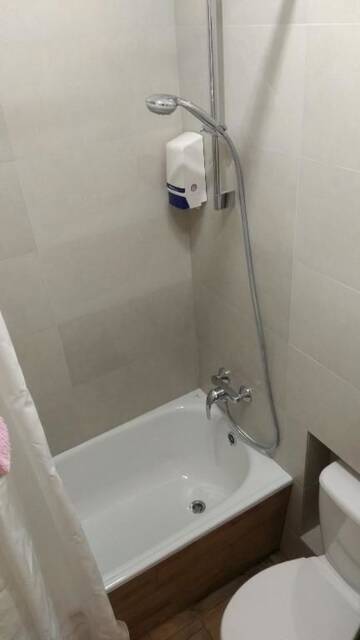 Фото номера Стандартный номер-студио Апартаменты N.A.N Apartments on Krushelnytska г. Киев 15