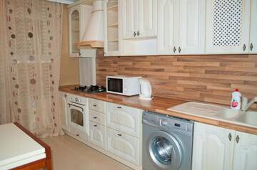 Фото номера Апартаменты с балконом Апартаменты KyivStay Pochaynynska Apartment г. Киев 27