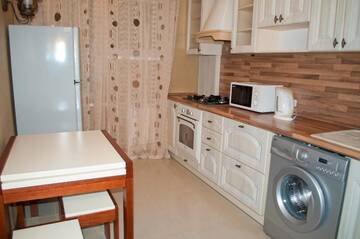 Фото номера Апартаменты с балконом Апартаменты KyivStay Pochaynynska Apartment г. Киев 31