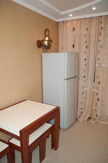Фото номера Апартаменты с балконом Апартаменты KyivStay Pochaynynska Apartment г. Киев 37