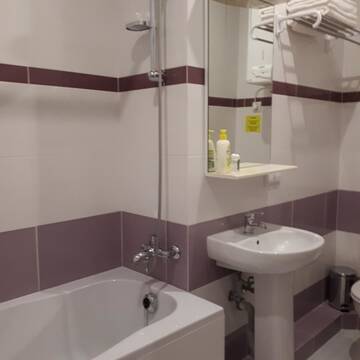 Фото номера Двухместный номер с 2 отдельными кроватями Мини-отель Z-apartments г. Киев 2