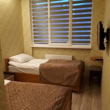 Фото номера Двухместный номер с 2 отдельными кроватями Мини-отель Z-apartments г. Киев 5