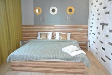 Фото номера Люкс с гидромассажной ванной Отель Mini Hotel on Demiivska г. Киев 12