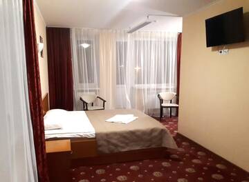 Фото номера Двухместный номер Делюкс с 1 кроватью и душем Отель Hotel Nika г. Киев 7