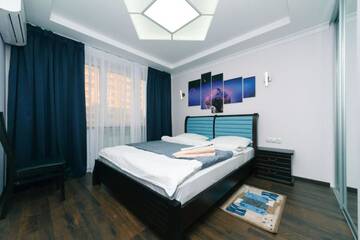 Фото номера Апартаменты с 3 спальнями Апартаменты BigLux Valerio Lesi Ukrainky 14&amp;7 г. Киев 12