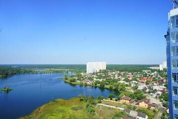 Фото номера Апартаменты с видом на озеро Апартаменты LuxCityApart on Ushakova 1V г. Киев 45