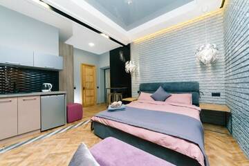 Фото номера Улучшенный номер-студио Апартаменты Tomas apartments г. Киев 7
