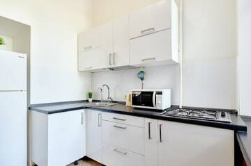 Фото номера Апартаменты с 2 спальнями Апартаменты S12-58 MODERN APARTHOTEL WITH TWO 2BEDROOMS IN CENTRAL KIEV - BESSARABSKA SQUERE - GULLIVER MALL - OLYMPIC STADIUM - PALACE OF SPORTS - Saksahanskoho St, 12Б г. Киев 28
