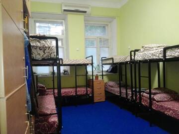 Фото номера Спальное место на двухъярусной кровати в общем номере для мужчин и женщин Хостелы Future г. Киев 4