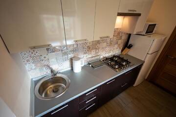 Фото номера Апартаменты с 2 спальнями Апартаменты Kyiv Rouge Apartment г. Киев 9