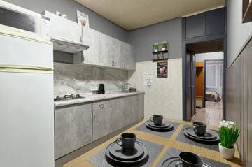 Фото номера Апартаменты с 3 спальнями Апартаменты V 80-28 MODERN SUPER LOFT - THREE NEW 3BEDROOMS 100 m2 FOR BIG COMPANY, GOOD VIEW ON OLYMPIC STADIUM, Velyka Vasylkivska St, 80 г. Киев 51
