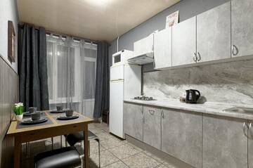 Фото номера Апартаменты с 3 спальнями Апартаменты V 80-28 MODERN SUPER LOFT - THREE NEW 3BEDROOMS 100 m2 FOR BIG COMPANY, GOOD VIEW ON OLYMPIC STADIUM, Velyka Vasylkivska St, 80 г. Киев 52