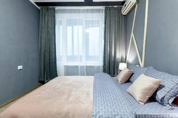 Фото номера Апартаменты с 3 спальнями Апартаменты V 80-28 MODERN SUPER LOFT - THREE NEW 3BEDROOMS 100 m2 FOR BIG COMPANY, GOOD VIEW ON OLYMPIC STADIUM, Velyka Vasylkivska St, 80 г. Киев 12