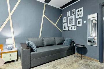 Фото номера Апартаменты с 3 спальнями Апартаменты V 80-28 MODERN SUPER LOFT - THREE NEW 3BEDROOMS 100 m2 FOR BIG COMPANY, GOOD VIEW ON OLYMPIC STADIUM, Velyka Vasylkivska St, 80 г. Киев 14
