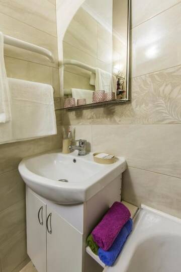 Фото номера Апартаменты с 1 спальней Апартаменты Warm, cozy flat near the metro. г. Киев 50