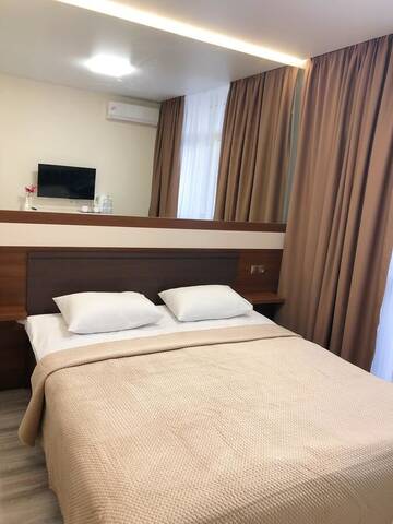 Фото номера Небольшой двухместный номер с 1 кроватью Апартаменты East Residence Gray г. Киев 4