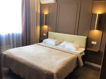 Фото номера Двухместный номер Делюкс с 1 кроватью Апартаменты East Residence Gray г. Киев 8