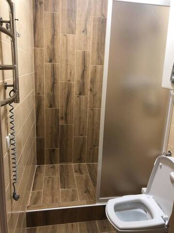 Фото номера Двухместный номер Делюкс с 1 кроватью Апартаменты East Residence Gray г. Киев 4