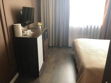 Фото номера Двухместный номер Делюкс с 1 кроватью Апартаменты East Residence Gray г. Киев 5
