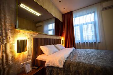 Фото номера Трехместный номер Отель Kyiv Panorama Apartments near Gulliver г. Киев 3