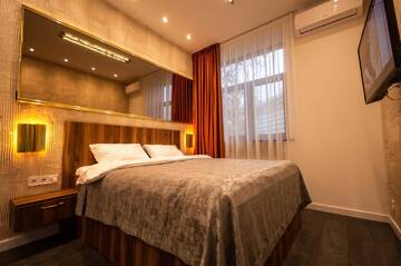 Фото номера Трехместный номер Отель Kyiv Panorama Apartments near Gulliver г. Киев 14