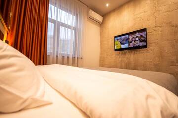 Фото номера Трехместный номер Отель Kyiv Panorama Apartments near Gulliver г. Киев 15