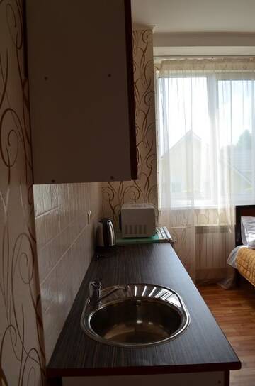 Фото номера Улучшенный четырехместный номер Отель SunLake Hotel Osokorki г. Киев 3