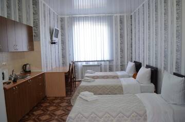 Фото номера Трехместный номер «Комфорт» Отель SunLake Hotel Osokorki г. Киев 3