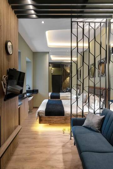 Фото номера Четырехместный номер «Премиум» Апартаменты Pushkinskaya Apartments г. Киев 4