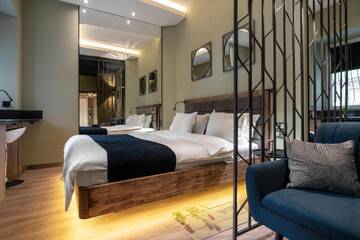 Фото номера Четырехместный номер «Премиум» Апартаменты Pushkinskaya Apartments г. Киев 7