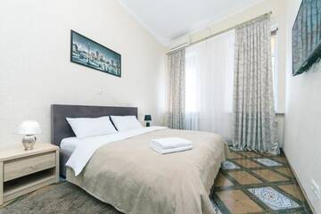 Фото номера Апартаменты Апартаменты 3 bedrooms on Maidan г. Киев 47