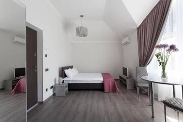 Фото номера Улучшенные апартаменты Апарт-отели Апартотель Sumskaya Apartments г. Киев 5