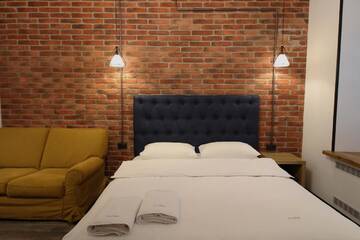 Фото номера Апартаменты Апартаменты Loft Apartments on Desyatynnyi Ln г. Киев 10