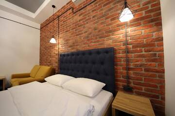 Фото номера Апартаменты Апартаменты Loft Apartments on Desyatynnyi Ln г. Киев 8