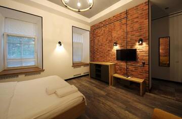 Фото номера Апартаменты Апартаменты Loft Apartments on Desyatynnyi Ln г. Киев 9