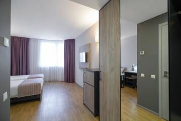 Фото номера Двухместный номер с 2 отдельными кроватями Отель Favor Sport Hotel г. Киев 9