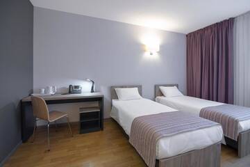 Фото номера Двухместный номер с 2 отдельными кроватями Отель Favor Sport Hotel г. Киев 10
