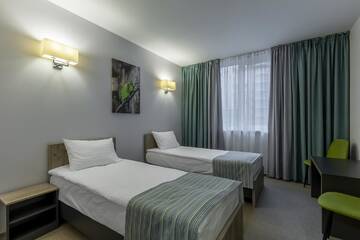 Фото номера Улучшенный семейный номер Отель Favor Sport Hotel г. Киев 7