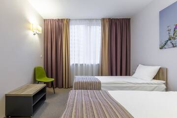 Фото номера Улучшенный семейный номер Отель Favor Sport Hotel г. Киев 3