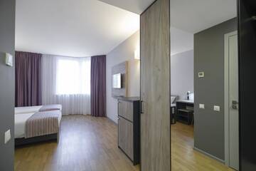 Фото номера Двухместный номер с 2 отдельными кроватями Отель Favor Sport Hotel г. Киев 3