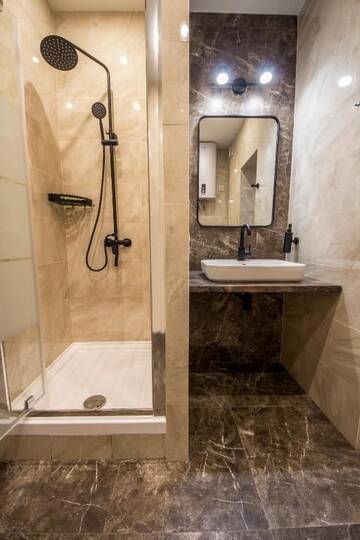 Фото номера Апартаменты с балконом Апартаменты Apartments on Ploscha Lva Tolstoho г. Киев 14