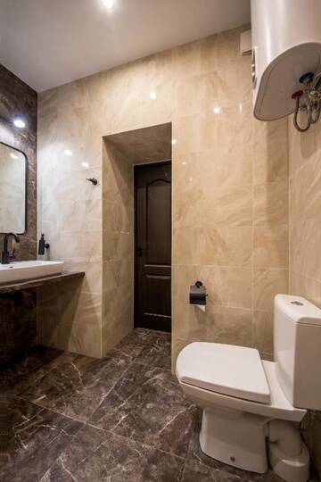 Фото номера Апартаменты с балконом Апартаменты Apartments on Ploscha Lva Tolstoho г. Киев 15