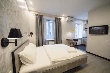 Фото номера Апартаменты с балконом Апартаменты Modern Apartments on Baseina near Arena City г. Киев 12