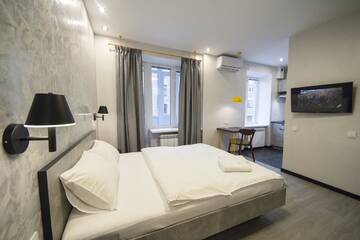 Фото номера Апартаменты с балконом Апартаменты Modern Apartments on Baseina near Arena City г. Киев 4