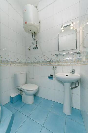 Фото номера Апартаменты с 3 спальнями Апартаменты Apartments near the Olympic Stadium г. Киев 122