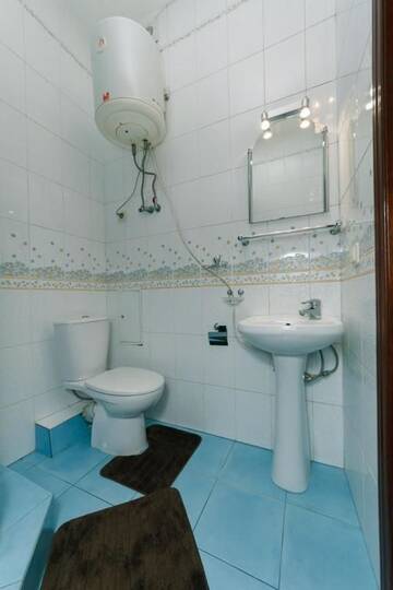 Фото номера Апартаменты с 3 спальнями Апартаменты Apartments near the Olympic Stadium г. Киев 92