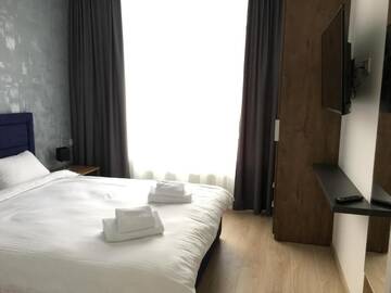 Фото номера Апартаменты с душем Апарт-отели Nyvky Residence г. Киев 3