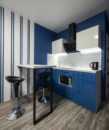 Фото номера Двухместный номер-студио Делюкс с 1 кроватью Апартаменты Solo Apartment Kamenskaya г. Киев 5